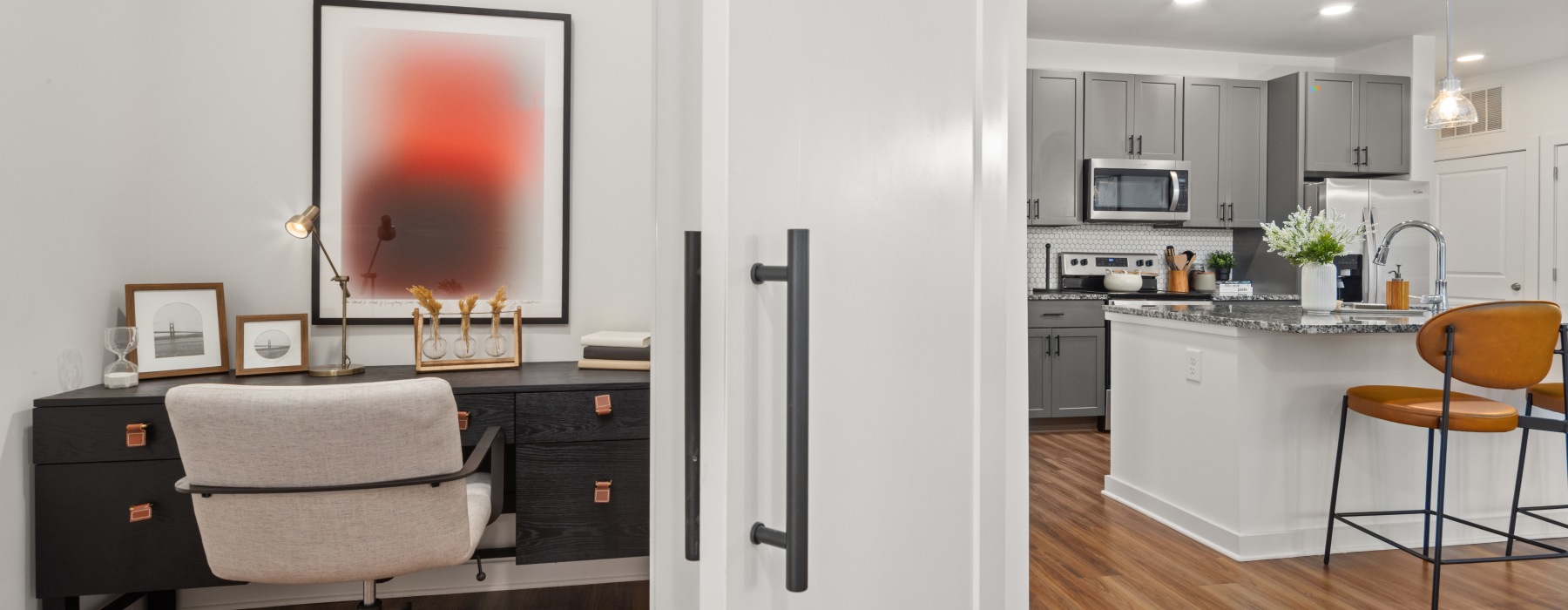 office and kitchen with island and stools